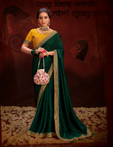 GREEN COLOUR HEAVY VICHITRA BLOOMING WITH SWAROVSKI WORK &SEQUENCE UNIQUE BORDER