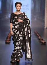 India Silk Black Sarees Crafted From Soft Lichi silk Cloth Offer A Perfect Blend Of Comfort