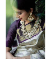 India Silk Presents Purple And Off-White Sarees Made From Soft Lichi Silk Known For Their Smooth Texture