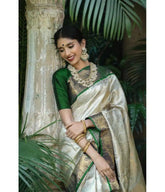 India Silk Presents Dark Green And Off-White Sarees Made From Soft Lichi Silk Known For Their Smooth Texture