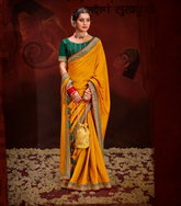 YELLOW COLOUR HEAVY VICHITRA BLOOMING WITH SWAROVSKI WORK &SEQUENCE UNIQUE BORDER