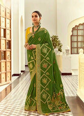 India Silk Dark Green Presents A Pure Viscose Saree Featuring A Delicately Hand-Worked Body That Showcases Exquisite Craftsmanship