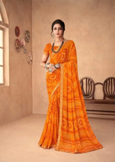India Silk Bright Orange Chiffon Saree Features A Beautifully Attached Banarasi Border Combining The Softness And Flow Of Chiffon