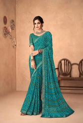 India Silk Teal Green Chiffon Saree Features A Beautifully Attached Banarasi Border Combining The Softness And Flow Of Chiffon