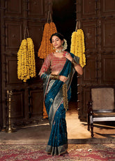 India Silk Teal Blue Sarees Showcase Pure Silk Weaving Combined With Fancy Fabric