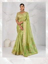 India Silk Mint Green Sarees Feature Premium Tissue Linen Fabric Enhanced With A Woven