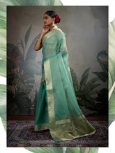 Elegant Pastel Tissue Silk Green colour Saree with Rich Woven Border – Lightweight Luxury Indian Ethnic Wear