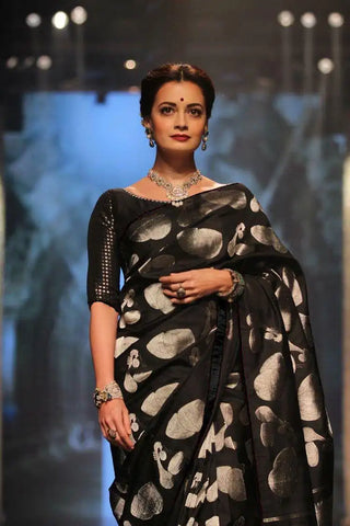 India Silk Black Sarees Crafted From Soft Lichi silk Cloth Offer A Perfect Blend Of Comfort