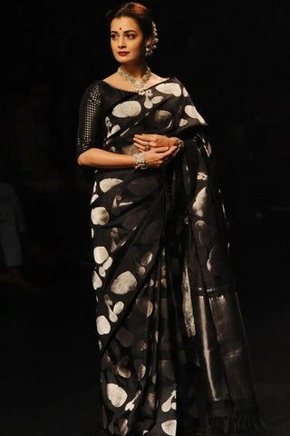 India Silk Black Sarees Crafted From Soft Lichi silk Cloth Offer A Perfect Blend Of Comfort