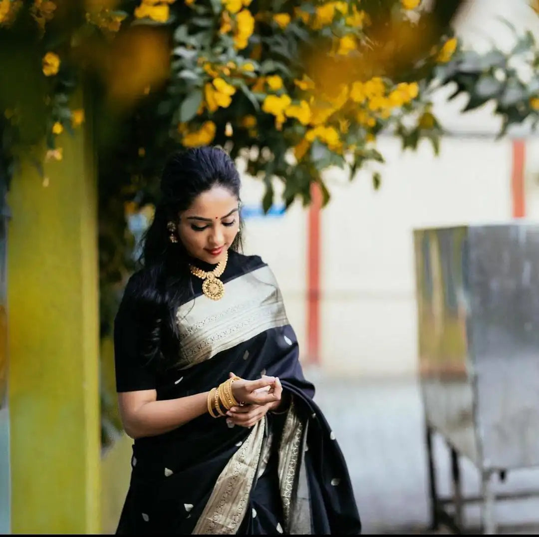 India Silk Black Sarees Crafted From Soft Lichi silk Cloth Offer A Perfect Blend Of Comfort