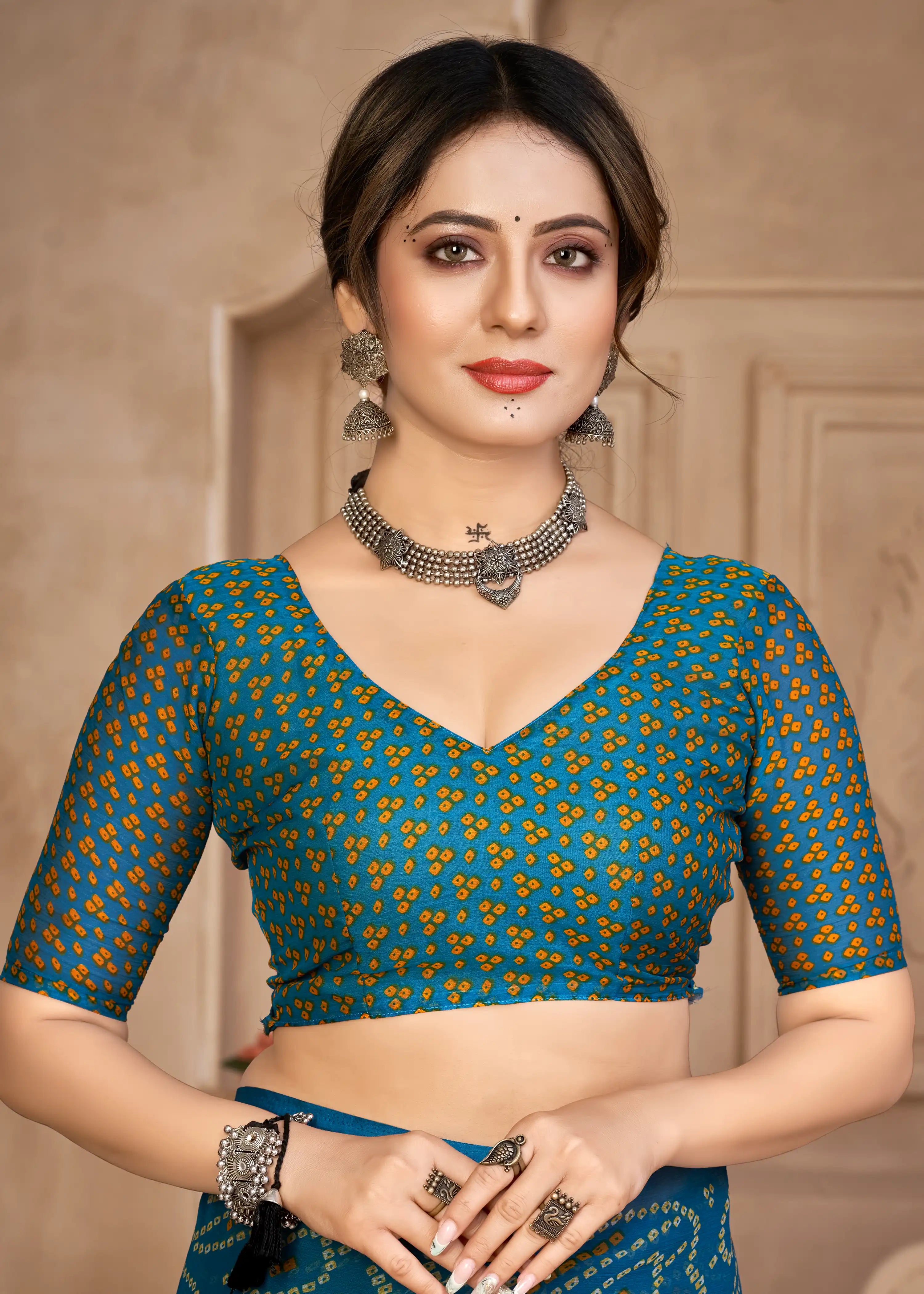 India Silk Teal Blue Chiffon Sarees Designed To Provide A Soft Flowing Silhouette That Enhances Your Natural Grace