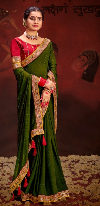 OLIVE GREEN COLOUR HEAVY VICHITRA BLOOMING WITH SWAROVSKI WORK &SEQUENCE UNIQUE BORDER (Copy) (Copy)