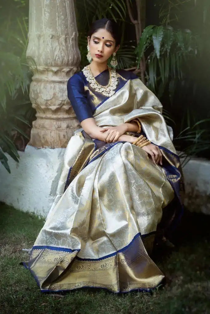 India Silk Presents Purple And Off-White Sarees Made From Soft Lichi Silk Known For Their Smooth Texture