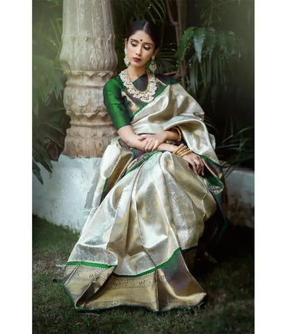 India Silk Presents Dark Green And Off-White Sarees Made From Soft Lichi Silk Known For Their Smooth Texture