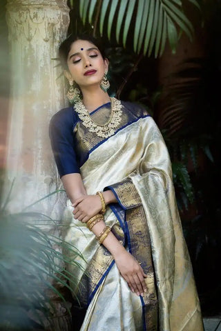 India Silk Presents Purple And Off-White Sarees Made From Soft Lichi Silk Known For Their Smooth Texture
