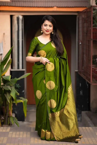India Silk Green Sarees Made From Soft Lichi Silk Cloth Combine Traditional Beauty With Exceptional Comfort