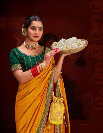 YELLOW COLOUR HEAVY VICHITRA BLOOMING WITH SWAROVSKI WORK &SEQUENCE UNIQUE BORDER