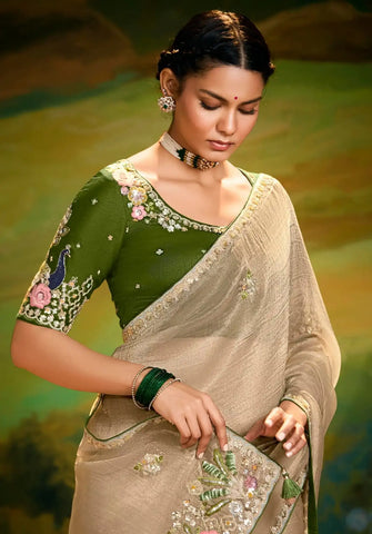 India Silk Off-White Sarees Crafted From Delicate Tissue Organza Feature Beautiful Embroidery With Traditional Butti