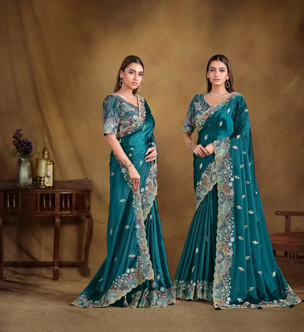 India Silk Teal Blue Sarees Featuring A Blend Of Multiple Fabrics Offer A Perfect Balance Of Elegance