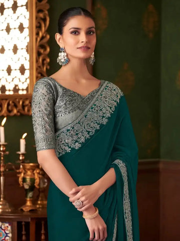 India Silk Teal Green Sarees Crafted From Soft Dola Viscose Silk Offer A Luxurious Feel And Graceful Drape
