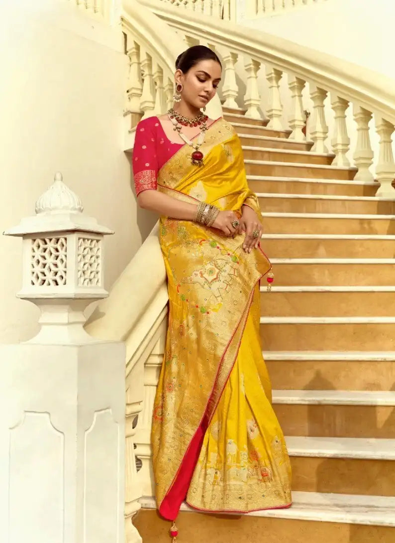 India Silk Yellow Presents A Pure Viscose Saree Featuring A Delicately Hand-Worked Body That Showcases Exquisite Craftsmanship