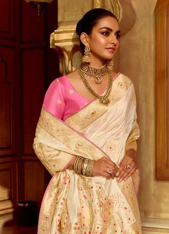 India Silk White Presents A Pure Viscose Saree Featuring A Delicately Hand-Worked Body That Showcases Exquisite Craftsmanship