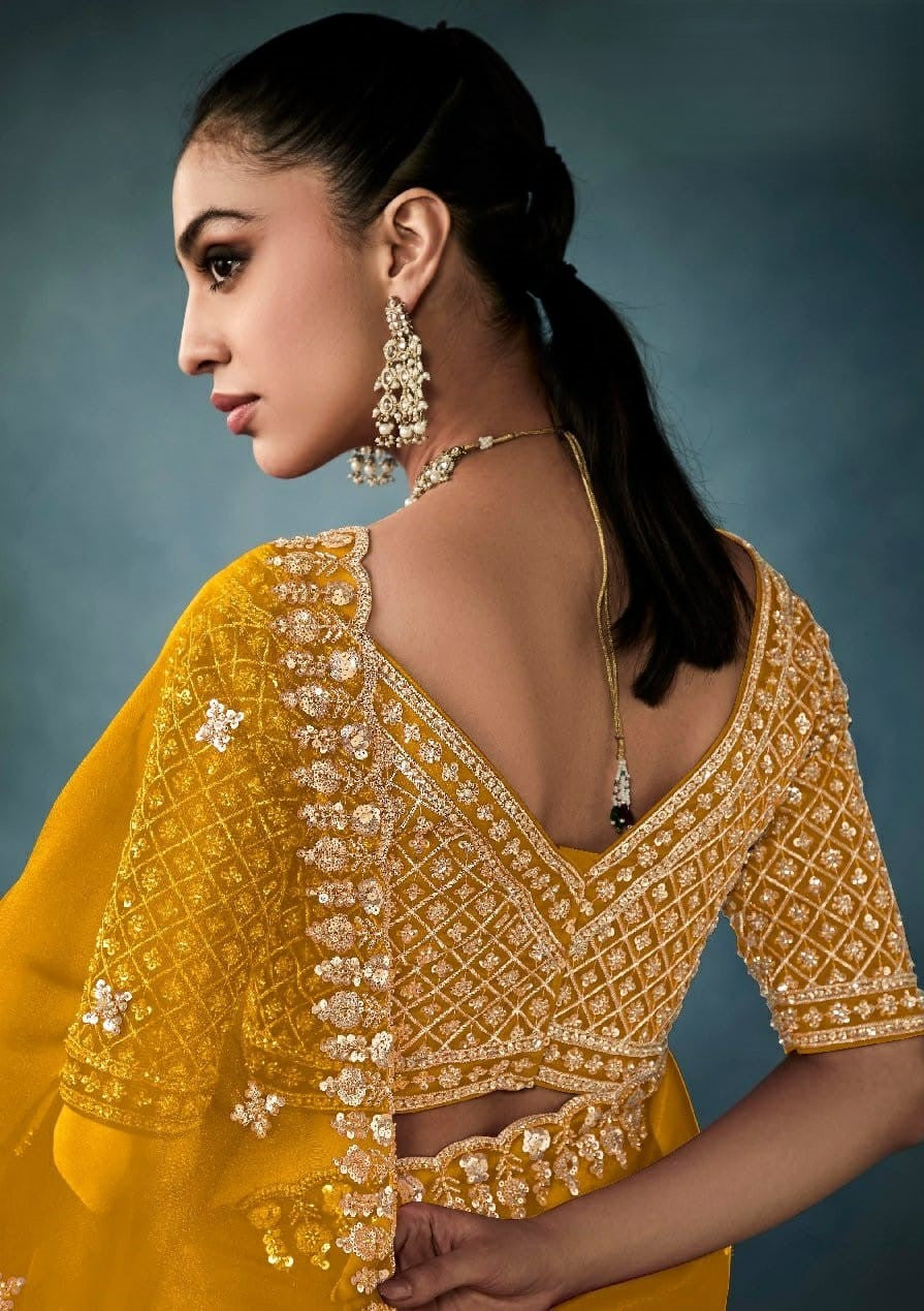 India Silk Yellow Sarees Crafted From Pure Fancy Fabric Showcase Delicate Hand-Worked Borders