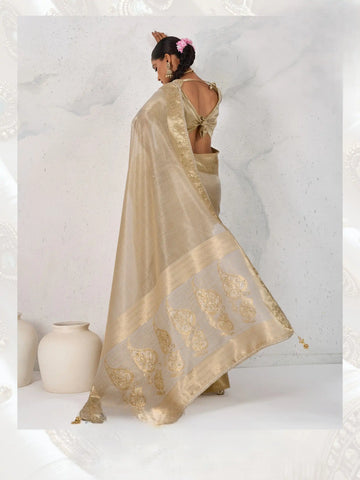 India Silk Grey Sarees Feature Premium Tissue Linen Fabric Enhanced With A Woven