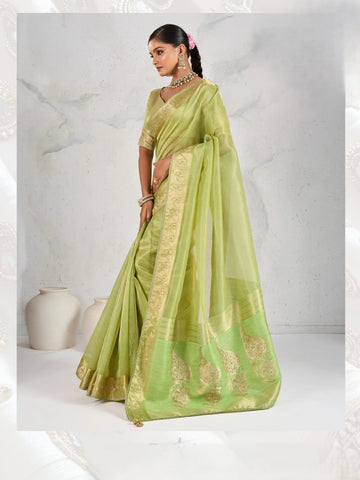 India Silk Mint Green Sarees Feature Premium Tissue Linen Fabric Enhanced With A Woven