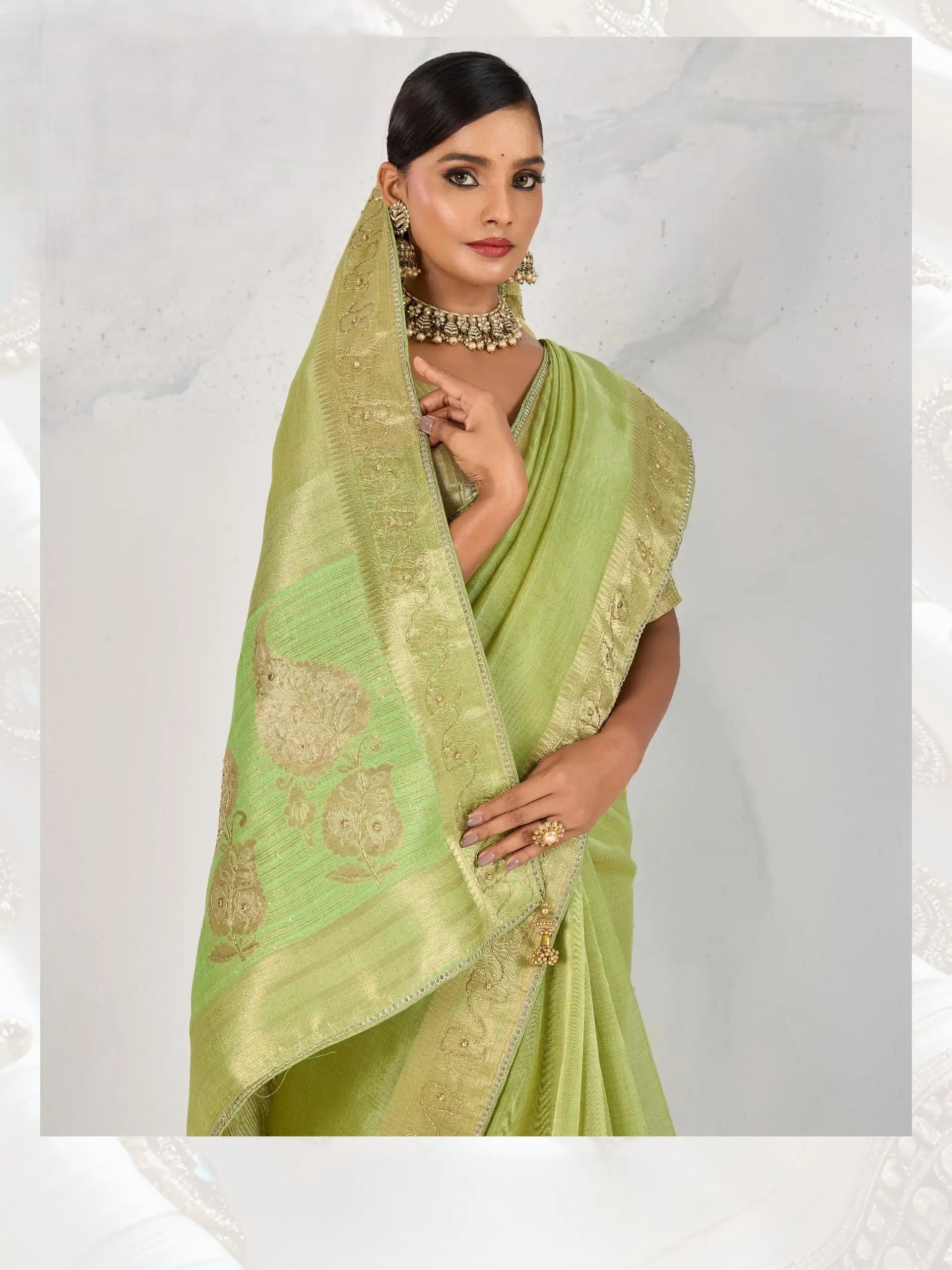 India Silk Mint Green Sarees Feature Premium Tissue Linen Fabric Enhanced With A Woven