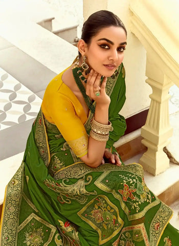 India Silk Dark Green Presents A Pure Viscose Saree Featuring A Delicately Hand-Worked Body That Showcases Exquisite Craftsmanship