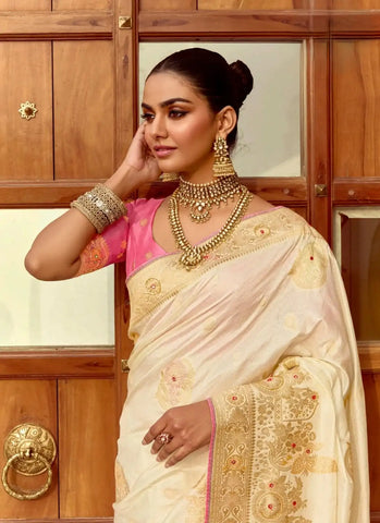 India Silk White Presents A Pure Viscose Saree Featuring A Delicately Hand-Worked Body That Showcases Exquisite Craftsmanship