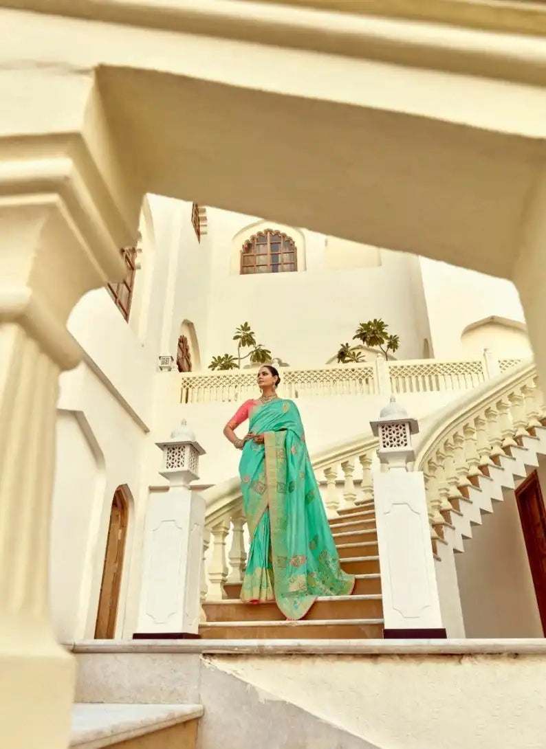 India Silk Sea Green Presents A Pure Viscose Saree Featuring A Delicately Hand-Worked Body That Showcases Exquisite Craftsmanship