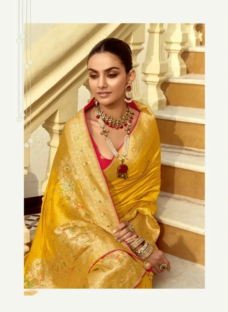 India Silk Yellow Presents A Pure Viscose Saree Featuring A Delicately Hand-Worked Body That Showcases Exquisite Craftsmanship