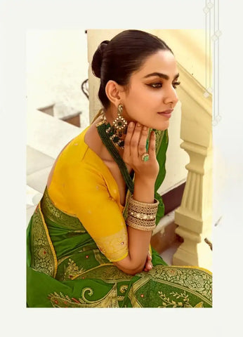 India Silk Dark Green Presents A Pure Viscose Saree Featuring A Delicately Hand-Worked Body That Showcases Exquisite Craftsmanship