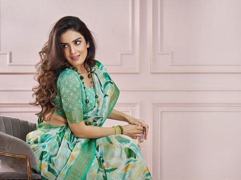 India Silk Mint Green Fancy Fabric offers a luxurious blend of texture and color, perfect for adding elegance