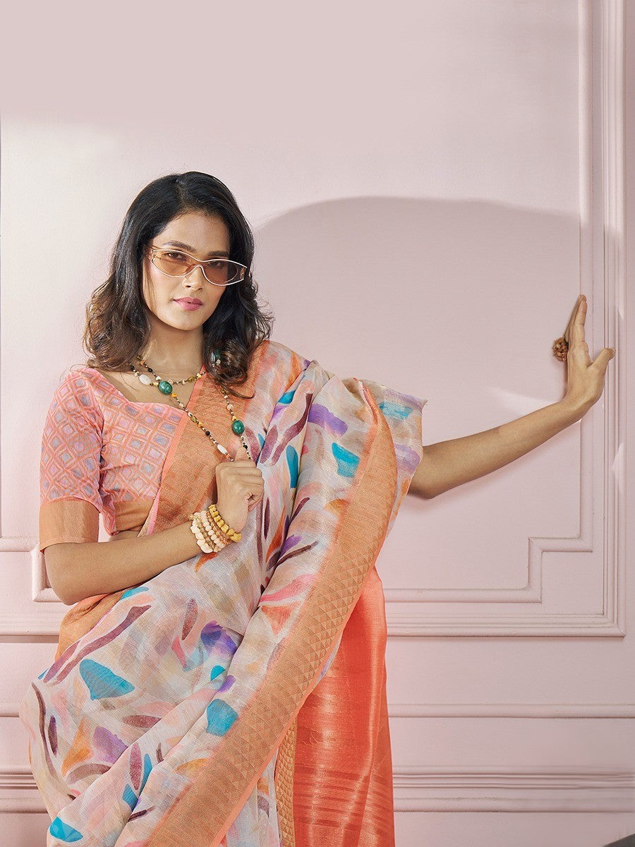India Silk White And Orange Boder Fancy Fabric offers a luxurious blend of texture and color, perfect for adding elegance