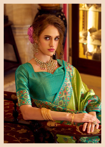 Green Banarasi Silk Saree with Multicolour Woven Border