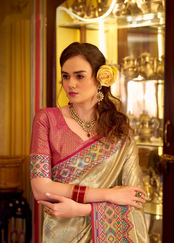 Cream Banarasi Silk Saree with Multicolour Woven Border