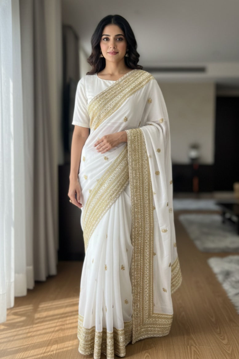 Ivory with gold embroidery and a gold woven border- UK